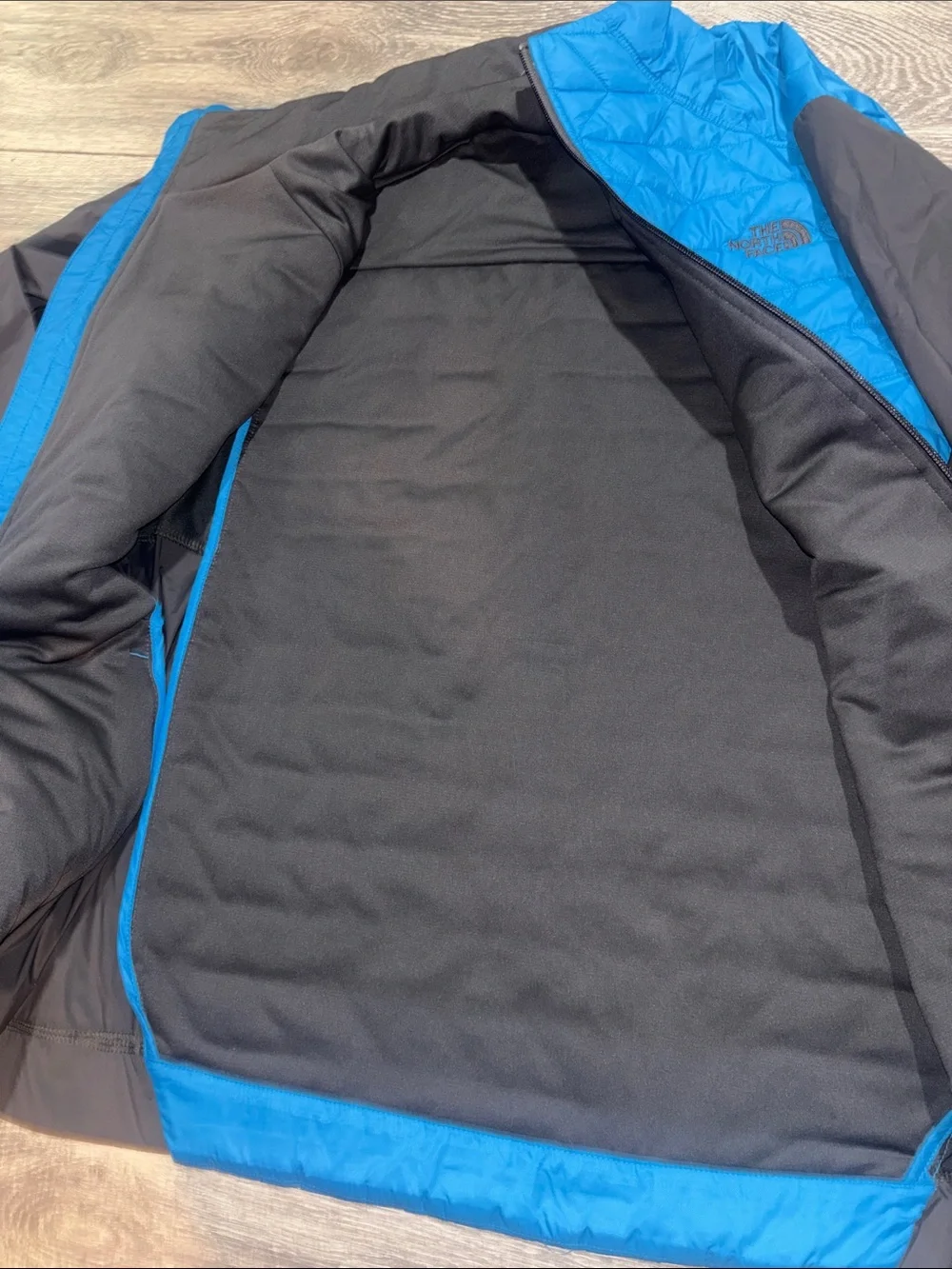The North Face Blue and Black Hybrid Puffer Jacket